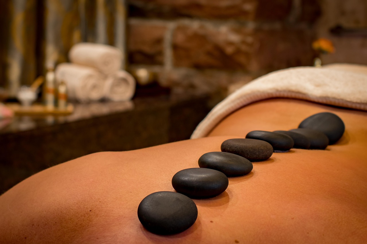 Hot Stone Massage Benefits: Madison, WI Expert Shares Tips for First-Timers